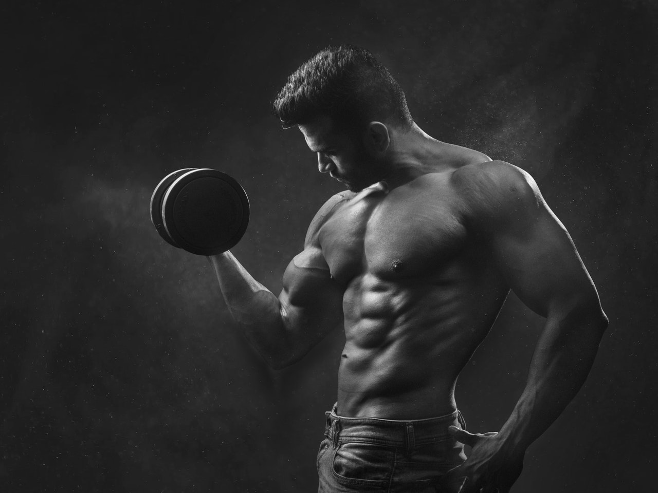 a gray picture of a muscular man